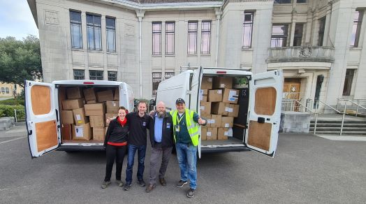 Picture shows Miles White, BCP Council’s Corporate FM Services Manager, (third from right) with the boxes of PPE set for Ukraine outside Poole Civic Centre.