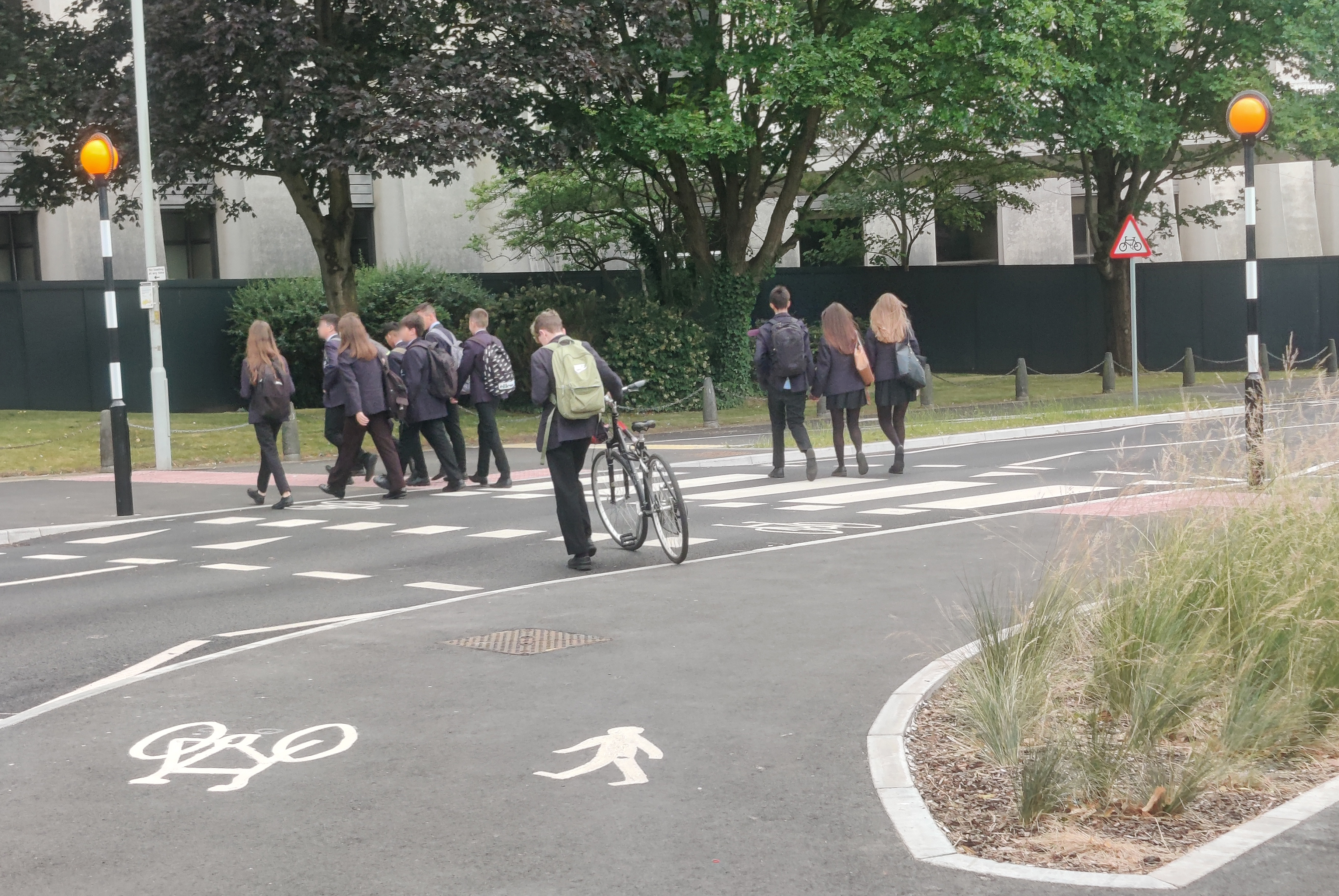 School students crossing Serpentine Road on one of the new crossings